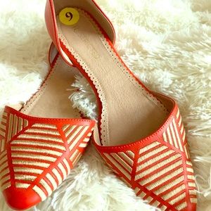 Restricted orange/gold flats